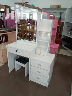 Dresser With a Sliding Mirror