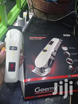 Geemy Proffessional Lcd Display Rechargeable Hair Clipper