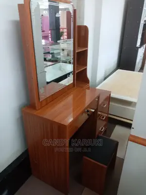 Brown Dresser With Sliding Mirror