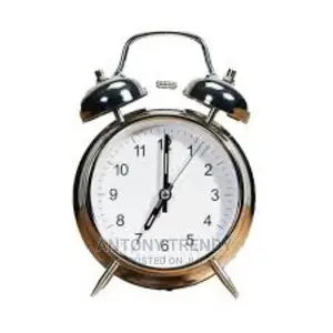 Vintage Alarm Clock on a Table
