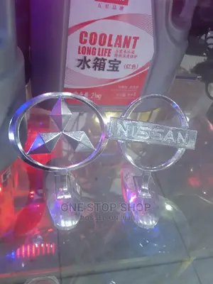 Mitsubishi And Nissan Bonnet Logos