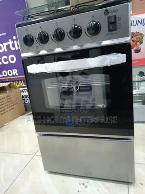 4 Gas Nunix Standing Oven Cooker With Electric Oven.