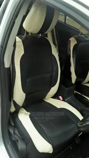 Cream and Black Car Seat Covers