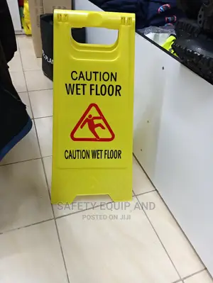 Caution Sign-Showing Wet Floor Ahead