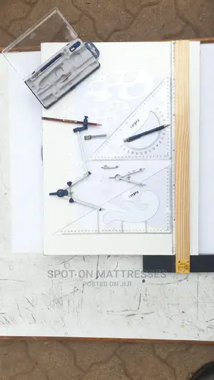 Drawing Set of Compasses on a Drawing Board