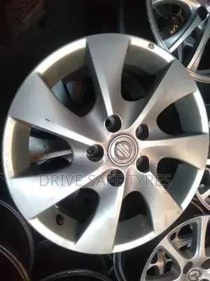 15 Inch Nissan Rims Set