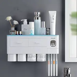 #Toothpaste Dispenser With Toothbrush Holder