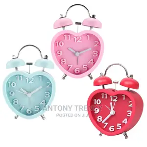 A Heart Shape Silent Bed Desk Alarm Clock