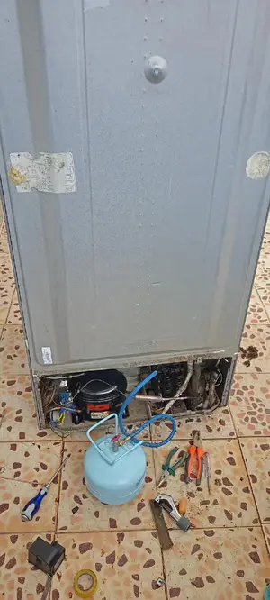 Fridge Repair and Gas Recharging.