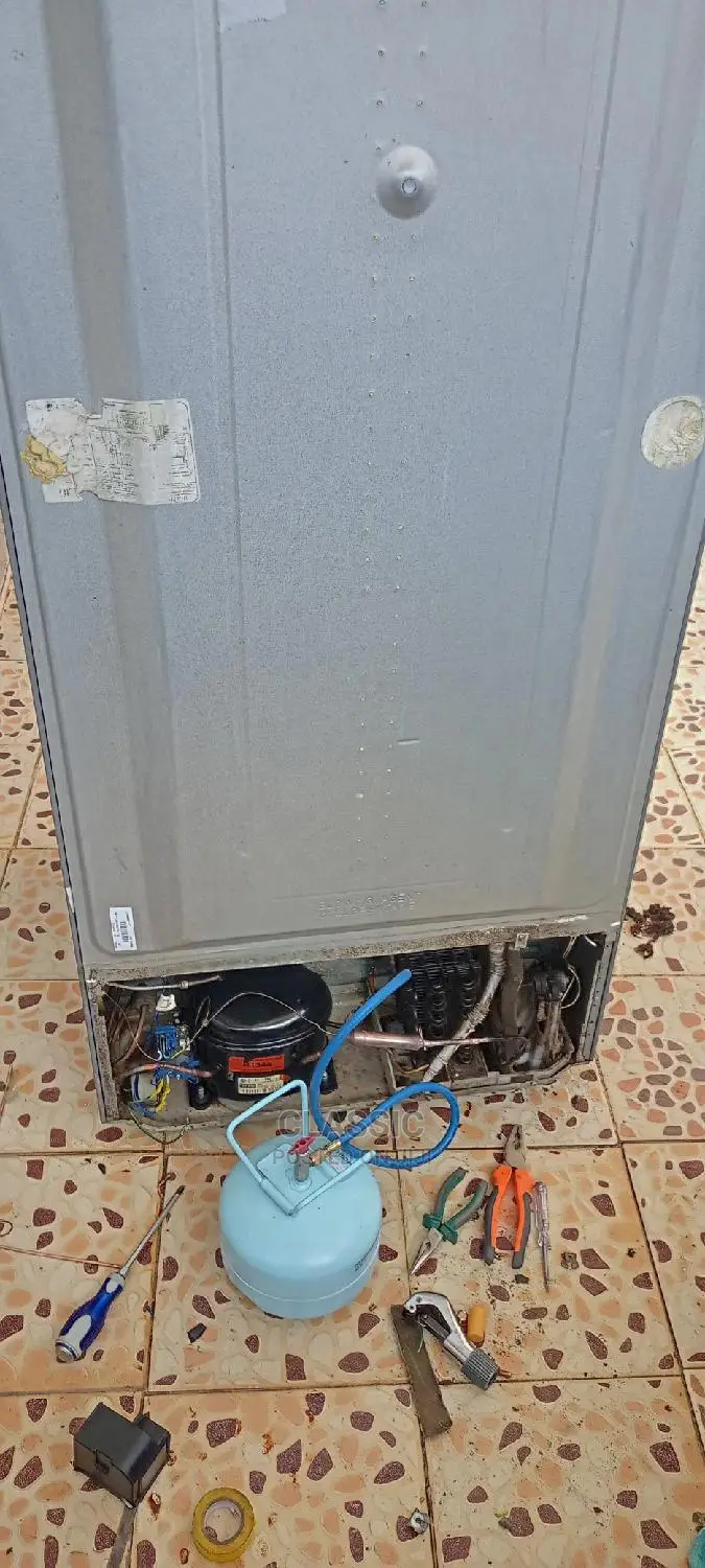 Fridge Repair and Gas Recharging.