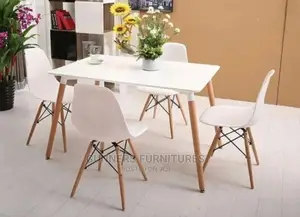 Eames Table and 4 Eames Chairs.