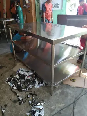 Stainless Steel Working Table/Top With Extra Shelf.