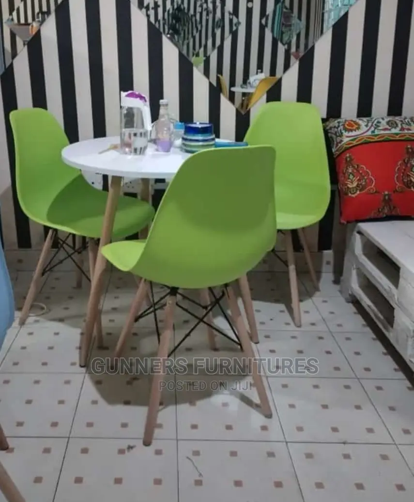 Eames Table and 3 Eames Chairs.