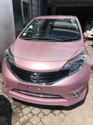 Pink Nissan Note 2015: Compact Car, Stylish, and Spacious