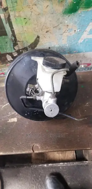 Mazda Familia Brake Booster/Master Cylinder.