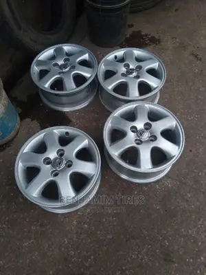 Original Rims Set Sizes 14 Inch 4 Holes.