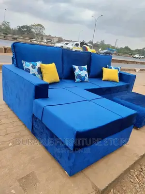 Blue L Shape Sofa And A Table