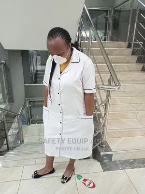 White With Black Piping Medical Dress