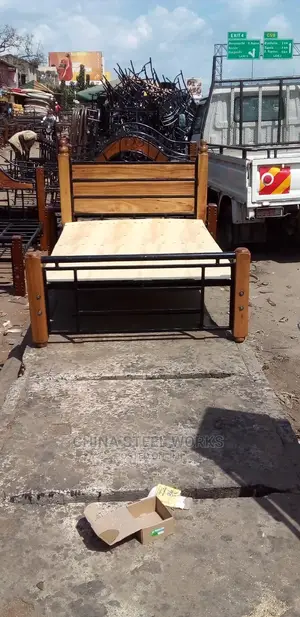 Metalic Frame Mahogany Stand Bed