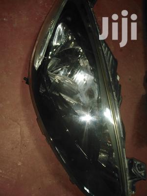 Mazda Demio 2010 Headlights