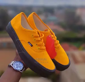 Yellow Vans Off the Wall Rubber Shoes.