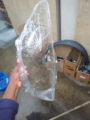 Mazda Demio Head Lens