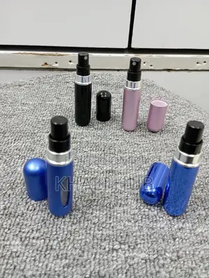 Mini Travel Spray Bottle.