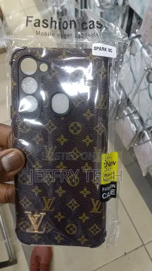 Tecno Spark 8C Mobile Skin (Louis Vuitton Multicolor Ski
