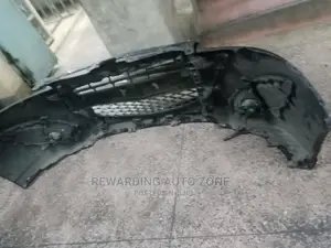 Mazda Primacy Front Bumper.