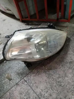Nissan Tiida 2009 Headlight.
