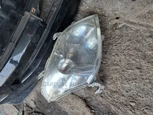 Toyota Raum Headlights