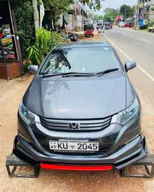 Car Fitted With Front Plastic Bumper Lip (Black and Red)