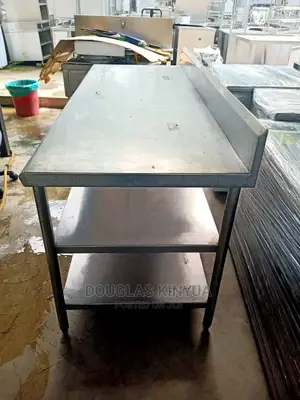 Stainless Steel Working Table. 1200cm by 60cm.
