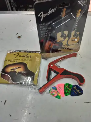 Guitar Capi With Strings and 4 Picks