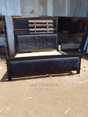 Black Tufted Bed