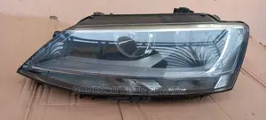 Volkswagen Jetta (Mk6) Left Nonxenon Headlight Assembly