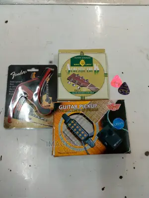 Guitar Pickup With Capo, Strings and 2 Picks