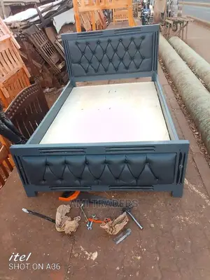 Black Tufted Bed