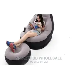 Inflatable Seat With Foot Rest and a Pump