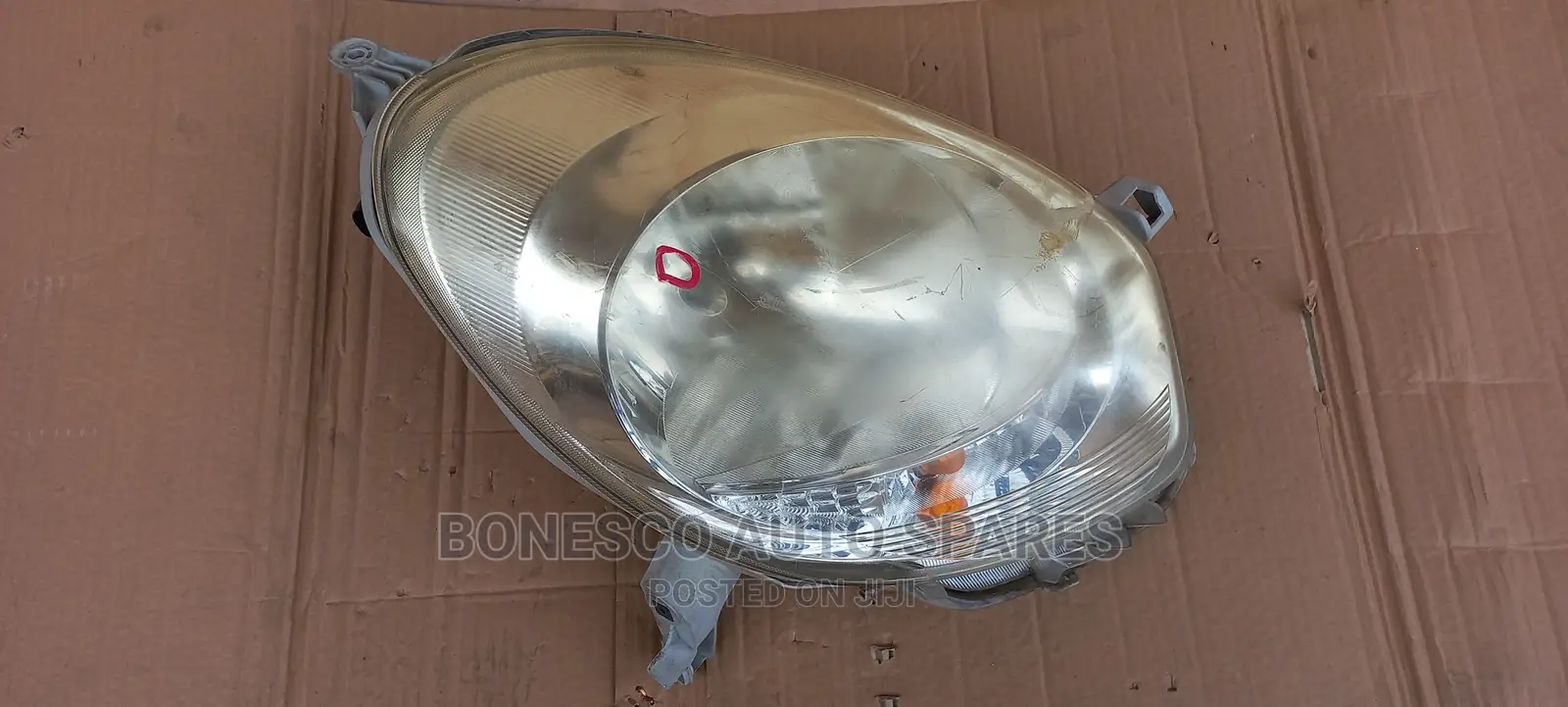 Passo 2012 Headlight
