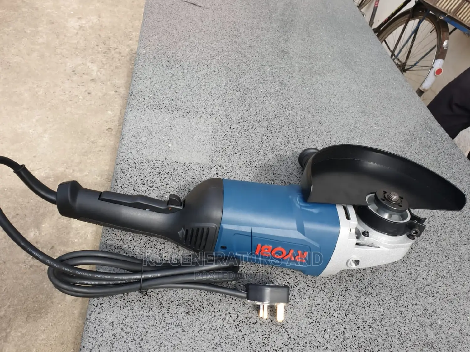 9 Inch Angle Grinder -Ryobi Brand.