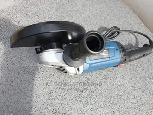 9 Inch Angle Grinder -Ryobi Brand.