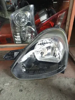 DAIHATSU MIRA Eis Headlights