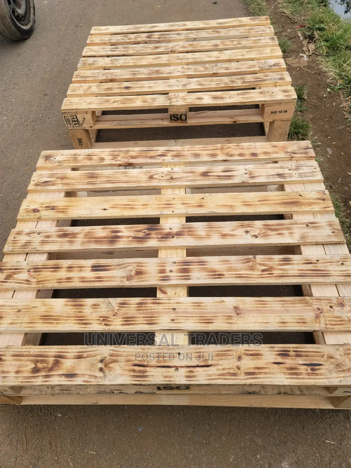 Torched Raised Wooden Pallet Bed
