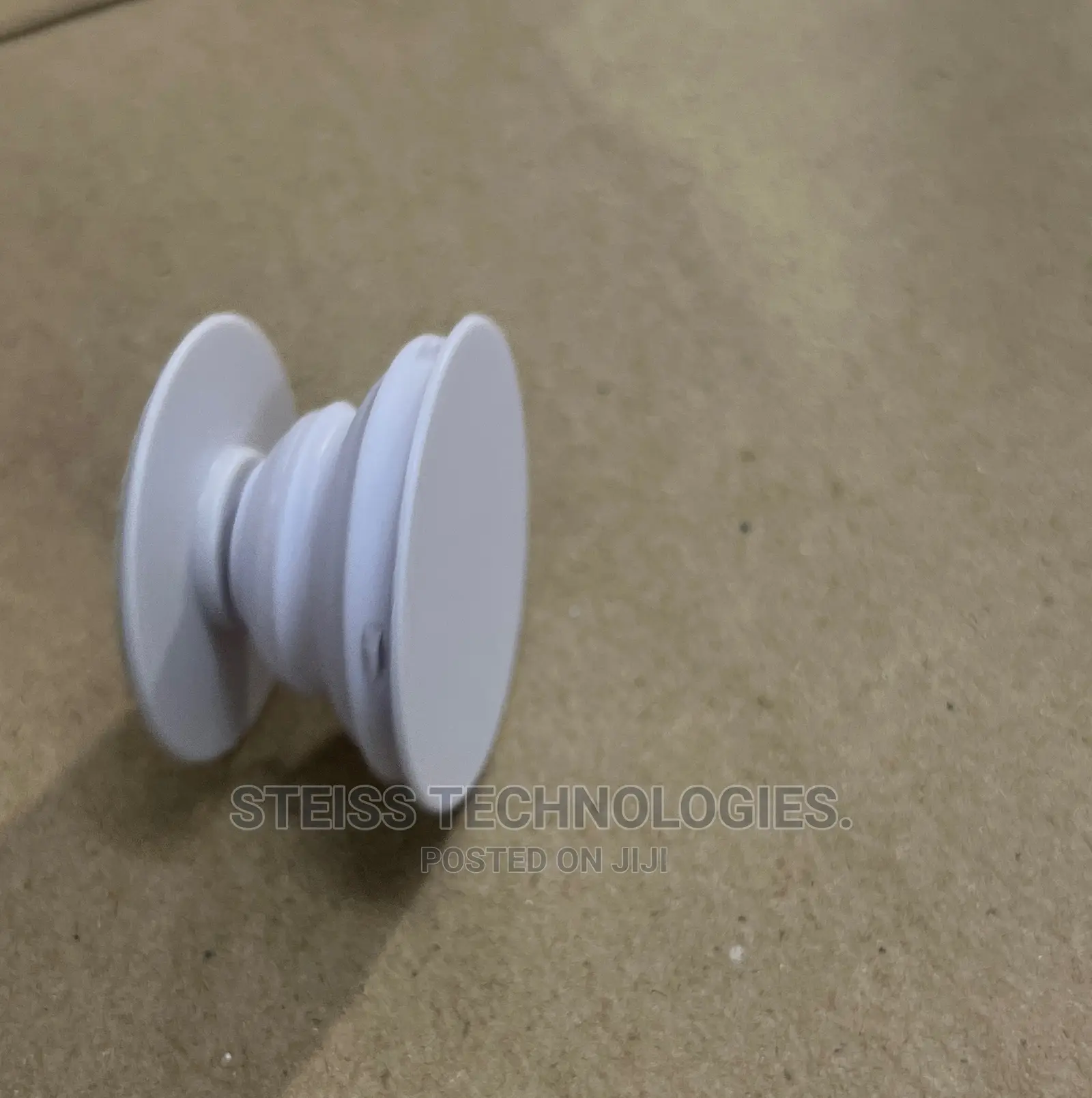 White and Black Pop Sockets.