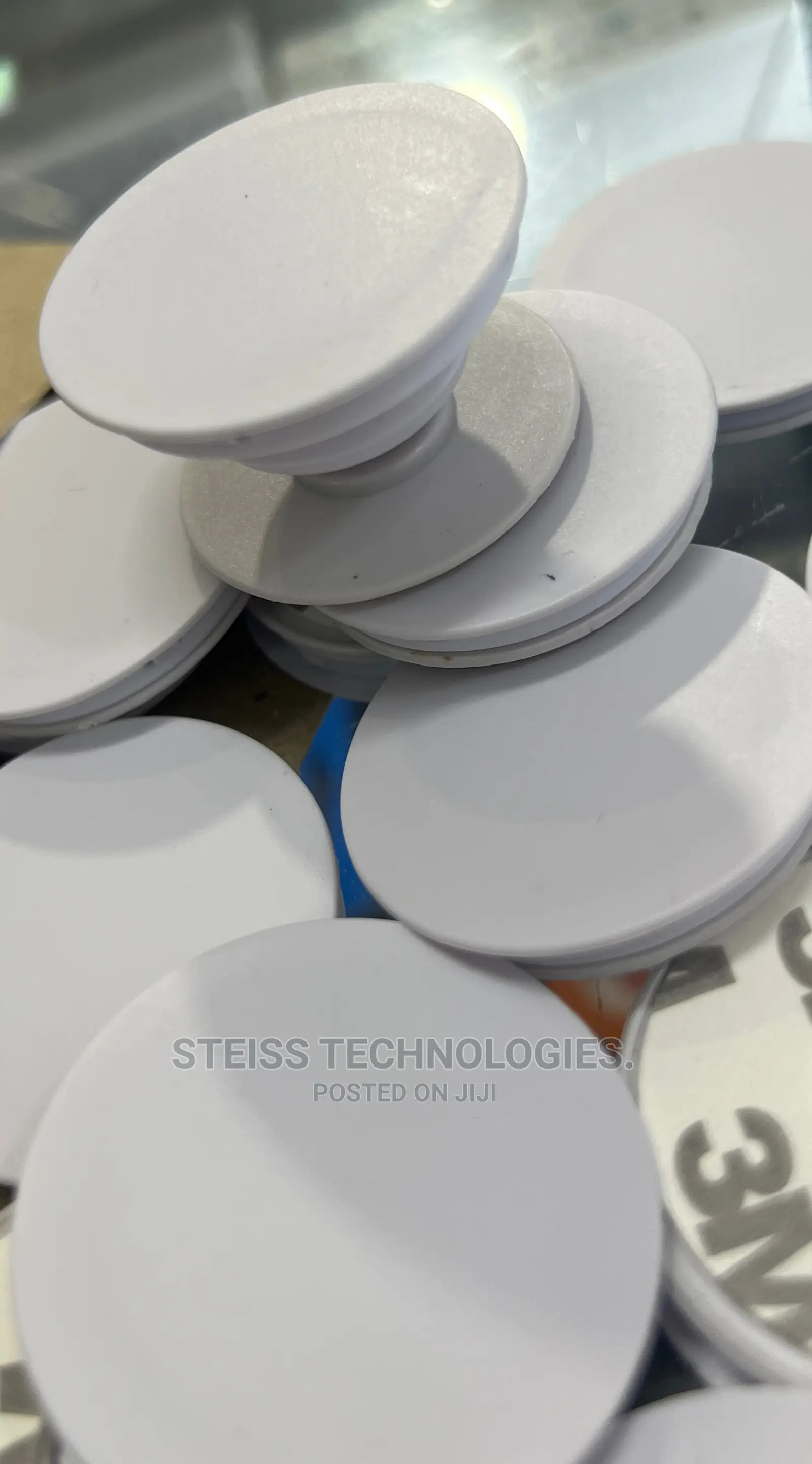 White and Black Pop Sockets.