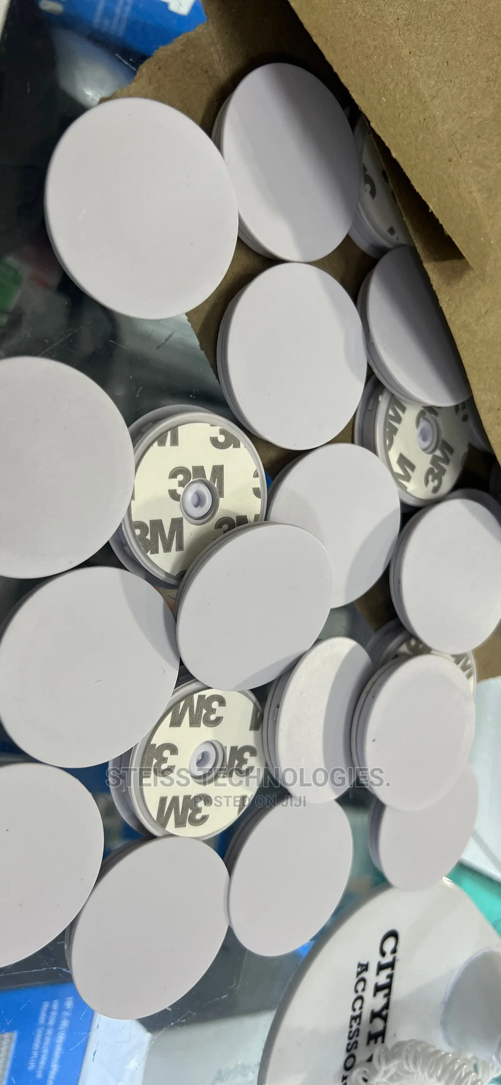 White and Black Pop Sockets.