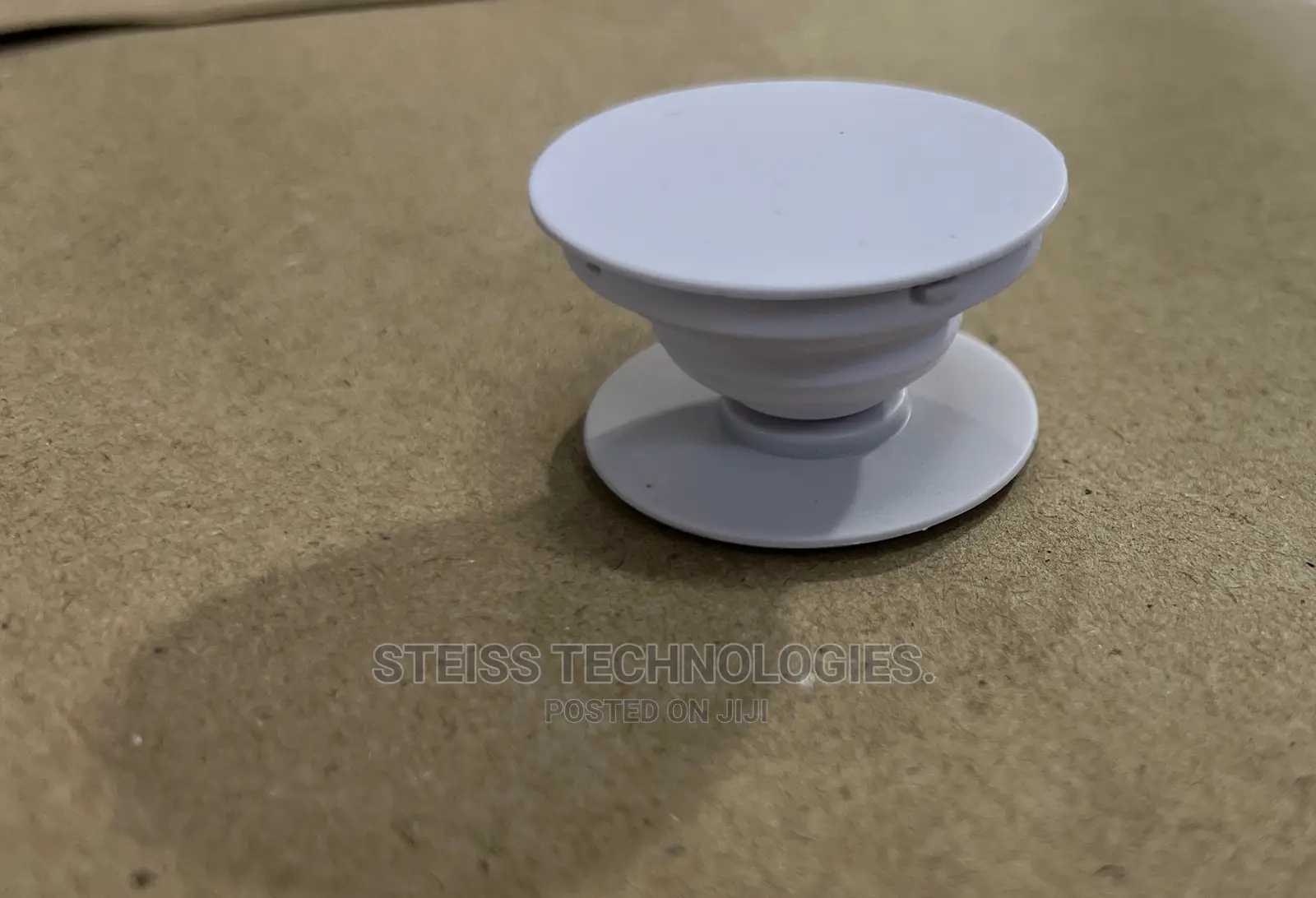 White and Black Pop Sockets.