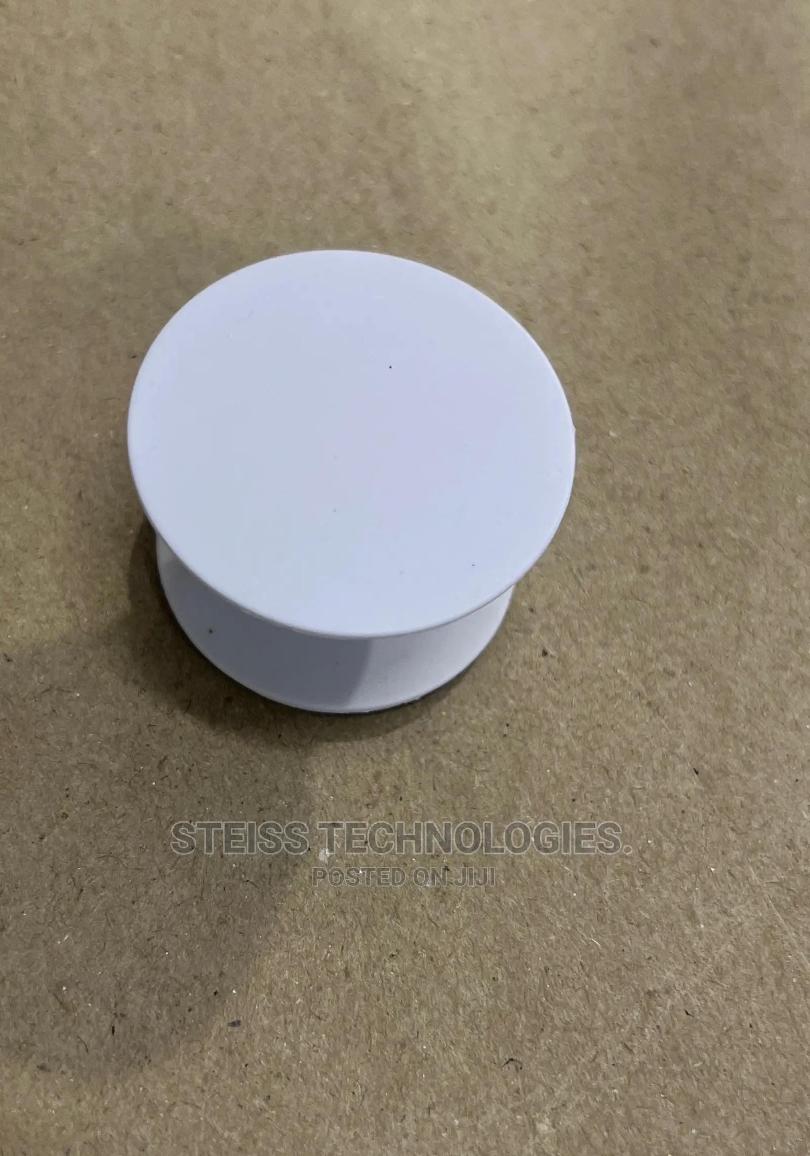 White and Black Pop Sockets.