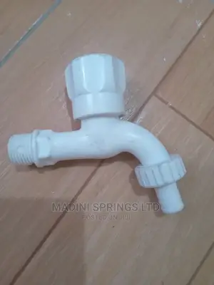 White Wall Plastic Taps